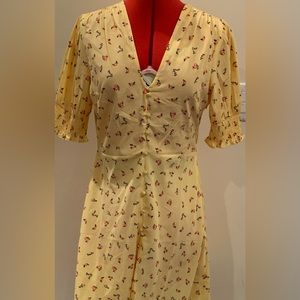 Yellow floral dress.